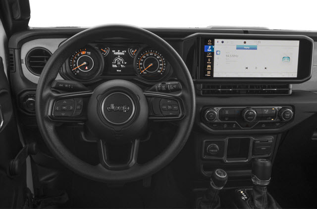 A 2026 Jeep Wrangler dashboard showing the steering wheel, control panel, and touchscreen display.